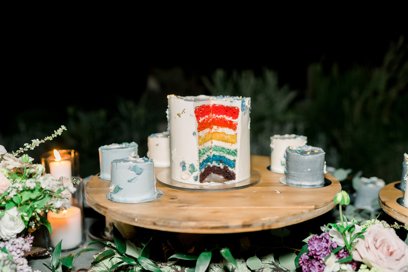 Mini wedding cakes with blue watercolor icing