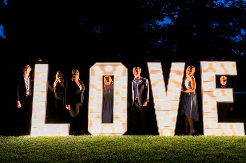 Evening outdoor wedding reception on the lawn of Park Winters