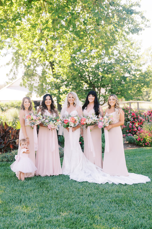 Blush summer wedding with bridesmaids in pink chiffon dresses
