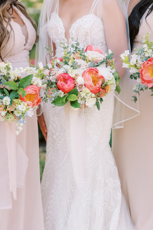 Blush summer wedding with bridesmaids in pink chiffon dresses