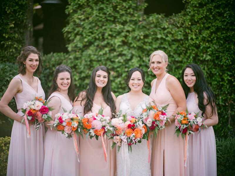 bridesmaids in mismatched gowns