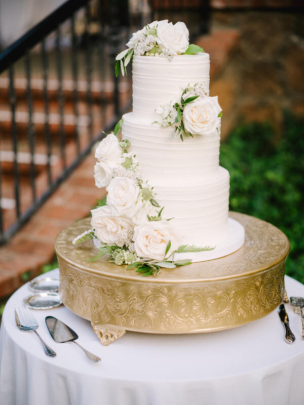 white wedding cake with roses by Flour and Bloom
