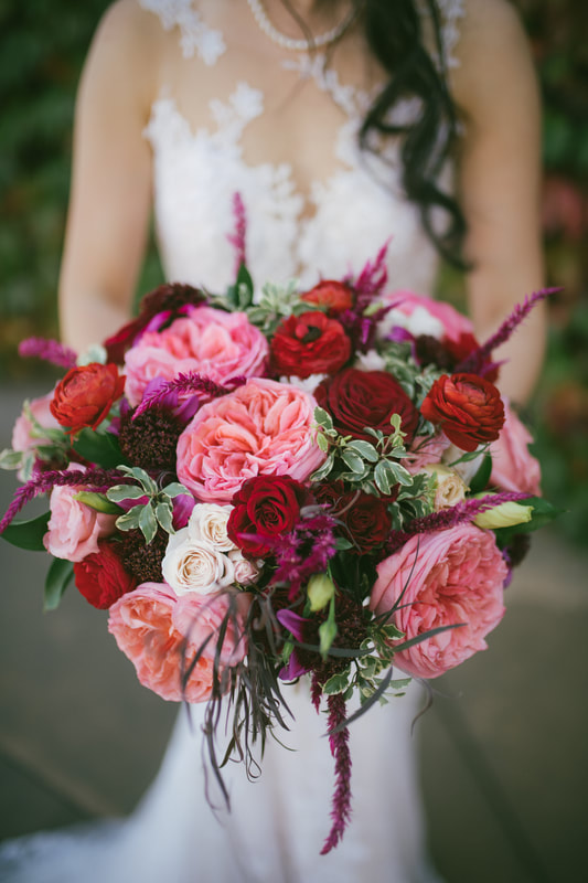 pink and red bridal bouquet by Strelitzia Flower Company 